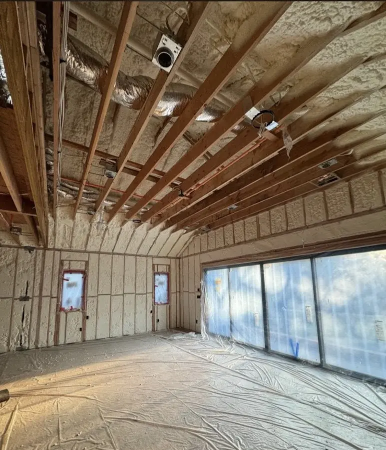 Interior walls and ceiling insulated with spray foam during new construction in Hazle